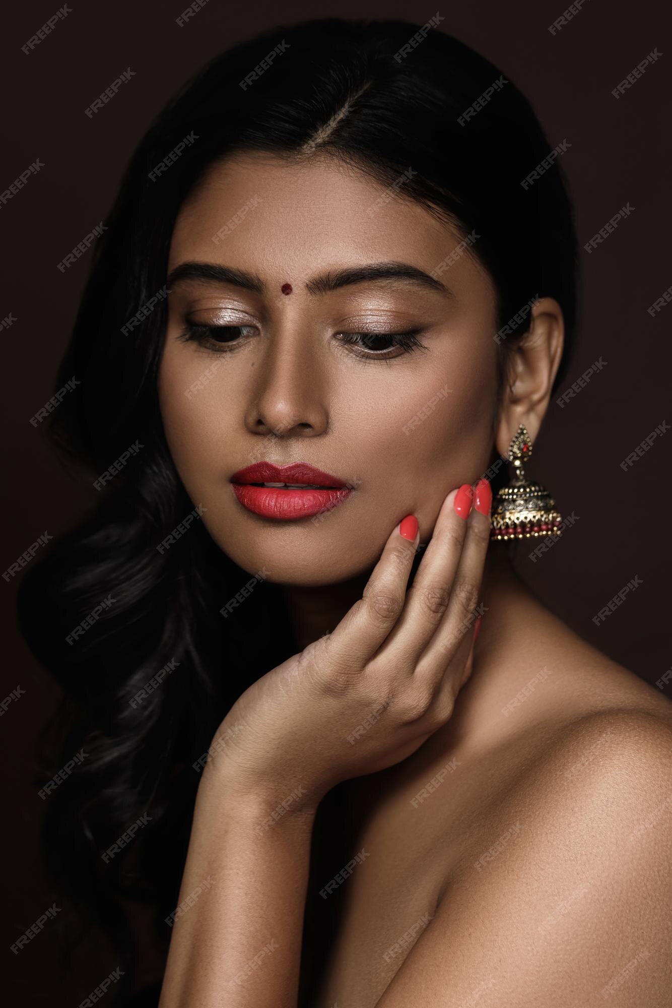 Premium Photo | Portrait of young indian woman with beautiful makeup and  hairstyle