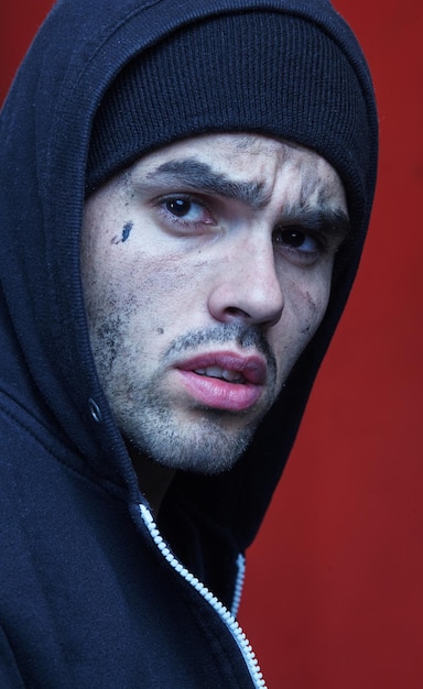 Photo portrait of a young lonely man. body language, gestures, body psychology concept.