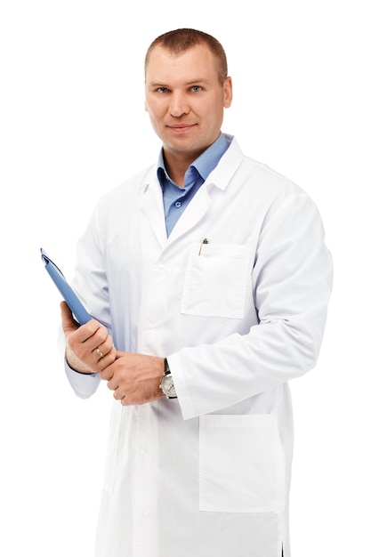 Portrait of a young male doctor in a white coat against a white