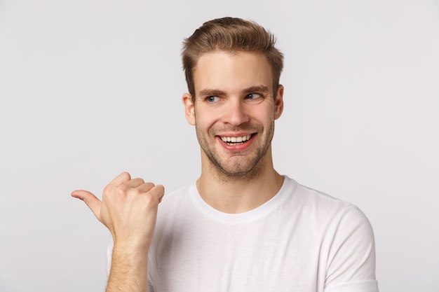 Portrait of young man against white background