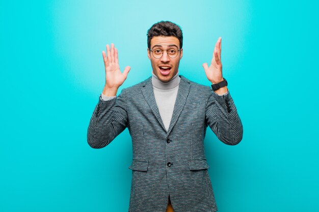 Portrait of a young man on a blue background