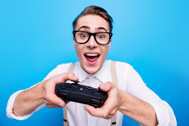 portrait of a young man on a blue background