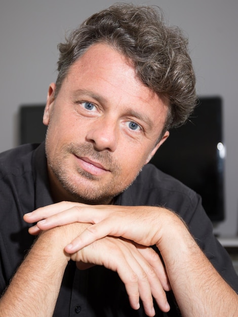 Portrait of a young man in his office