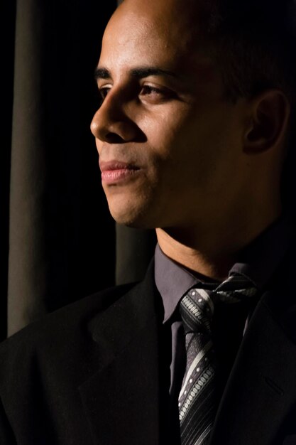 Portrait of young man looking away