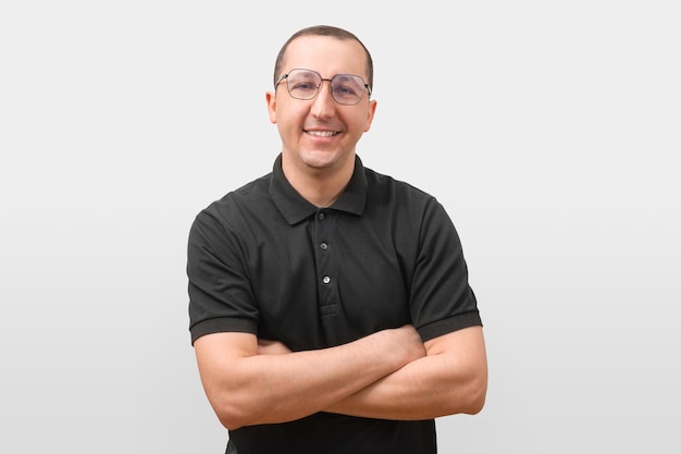 Portrait of a young man looking at the camera on a white background success concept