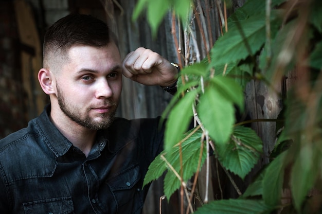 Portrait of a Young man in a shirt and trousers