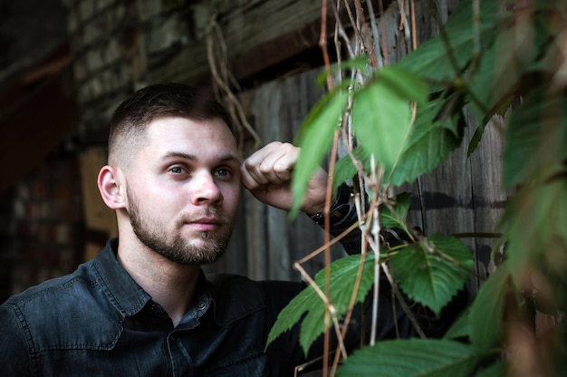 Portrait of a Young man in a shirt and trousers