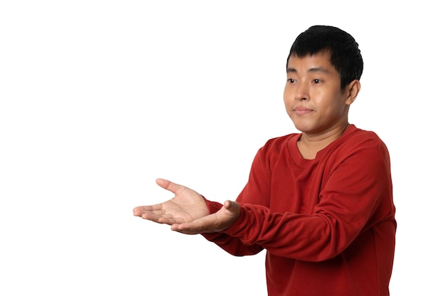 Portrait of young man showing presenting by hand Human emotion expression concept Studio shot isolated on white background copy space