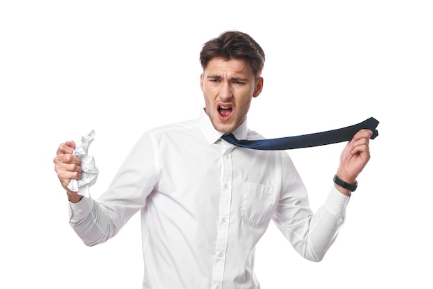 portrait of young man standing against white background