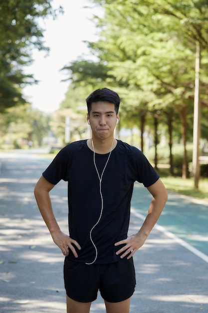 Portrait of young man standing outdoors