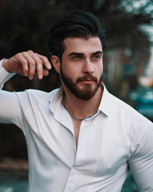 Portrait of young man standing outdoors