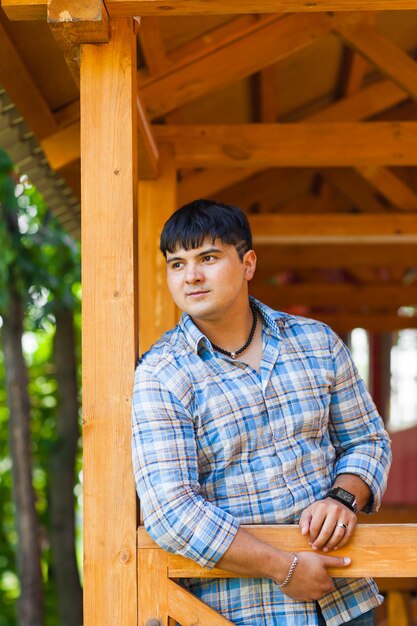 Portrait of young man standing outdoors