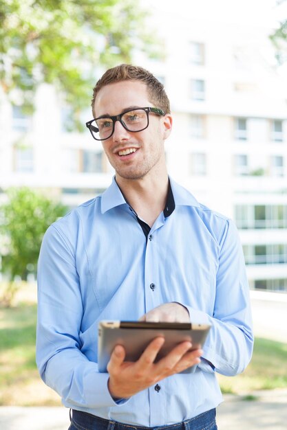 Portrait of young man using smart phone