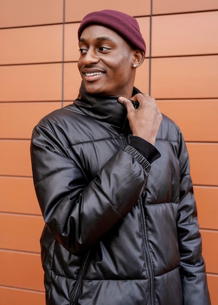 Portrait young man wearing cap