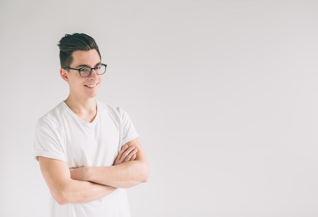 Portrait of young man wearing glasses