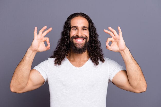 portrait young man with beard and long hair