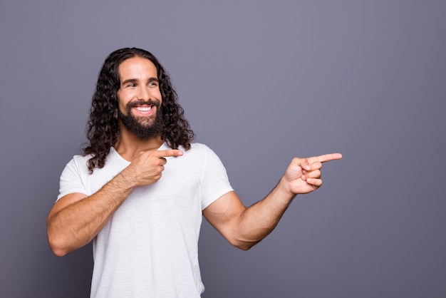 portrait young man with beard and long hair