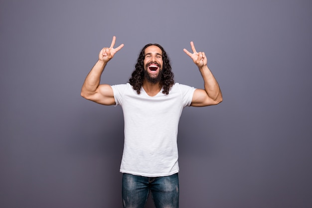 portrait young man with beard and long hair