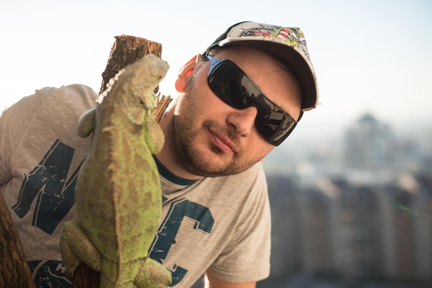 portrait of the young man with the iguana