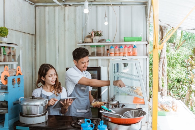 Portrait of young men and women prepare food in mika plastic