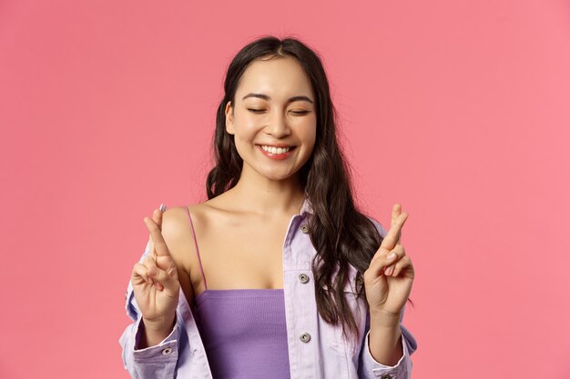 Portrait young mixed-race woman showing gesture.