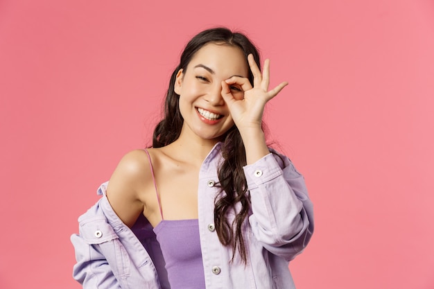 Portrait young mixed-race woman showing gesture.