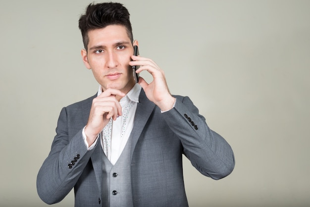 Portrait of young multi ethnic businessman in suit