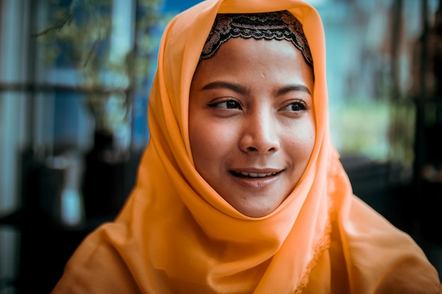 Portrait of  Young Muslim woman in coffee shop 