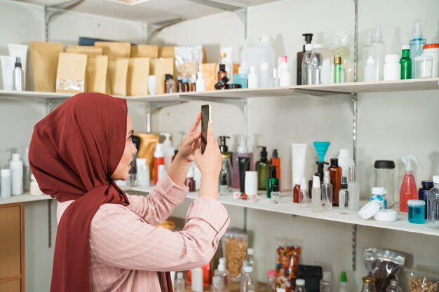 Portrait of young Muslim woman in a store