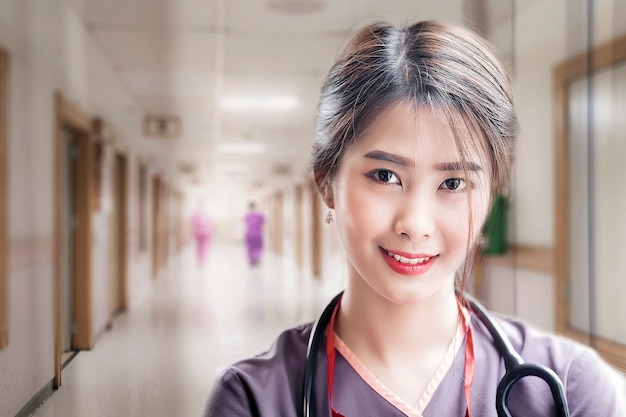 Portrait of young nurse in uniform