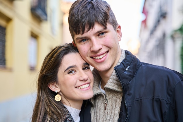 Portrait of young people in love looking at the camera