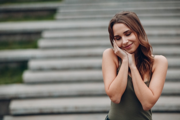 Portrait of young positive Woman with brown hair