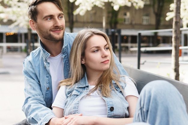 Portrait of young sensual and loving couple during a date outdoors