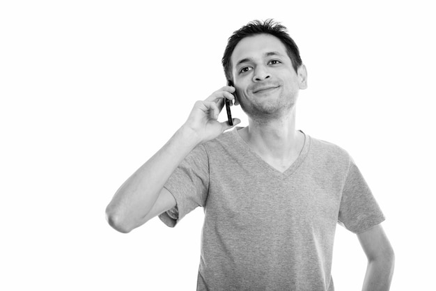 Portrait of young skinny man isolated on white in black and white