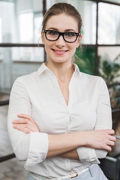 Portrait of young smiley businesswoman