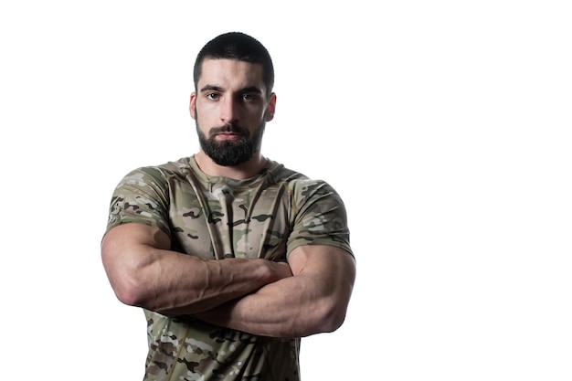 Portrait of Young Soldier Arms Crossed on a White Background