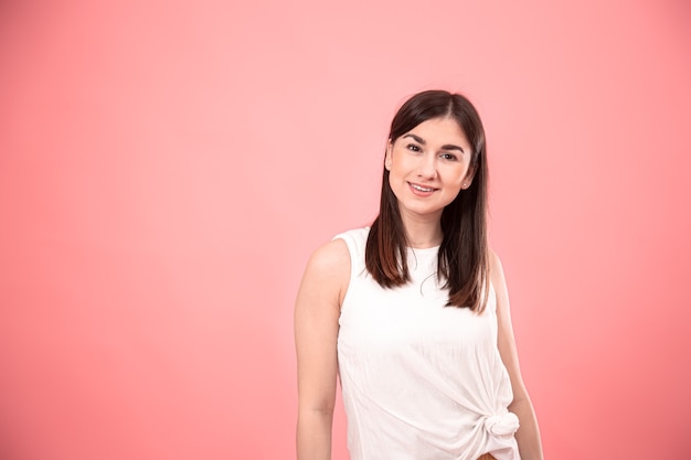 Portrait of young stylish woman with smile on face isolated copy space.