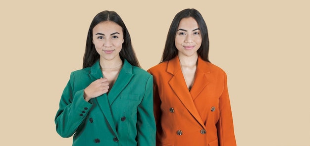 portrait of young twin sisters jacket