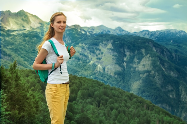 portrait the young woman admiring mountains