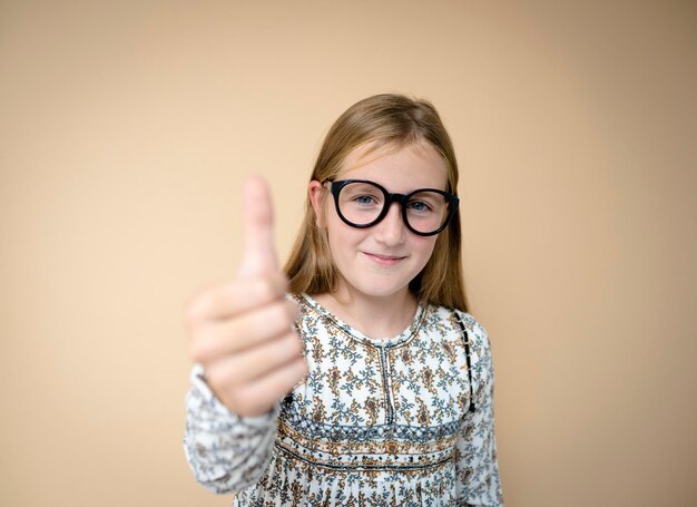 Portrait of young woman against white background