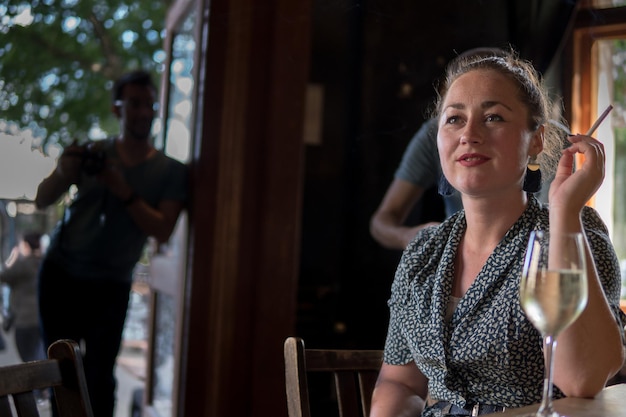 Portrait of a young woman in bar