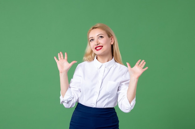 portrait of young woman in conservative clothing green wall lesson schools study student teacher