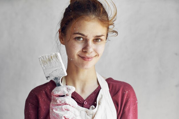 Portrait of young woman holding ice cream