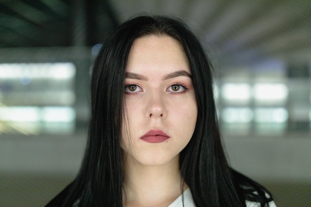 Portrait of young woman indoors