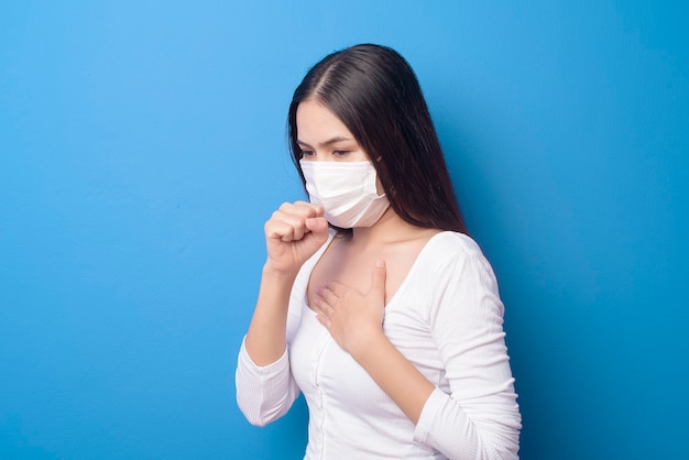 Portrait of young woman is wearing face mask