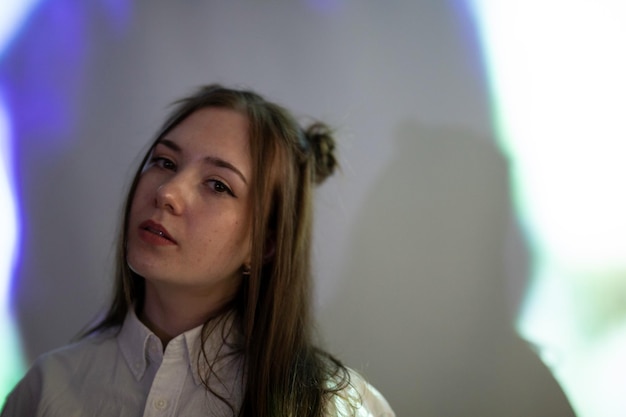 Portrait of a young woman looking away