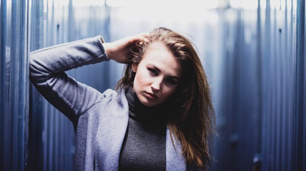 Portrait of young woman looking away