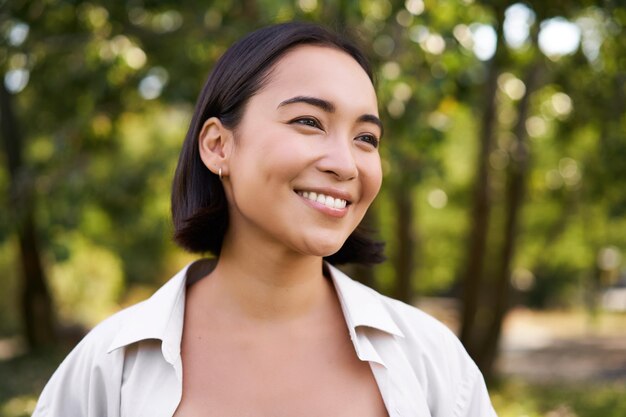 Portrait of young woman looking away