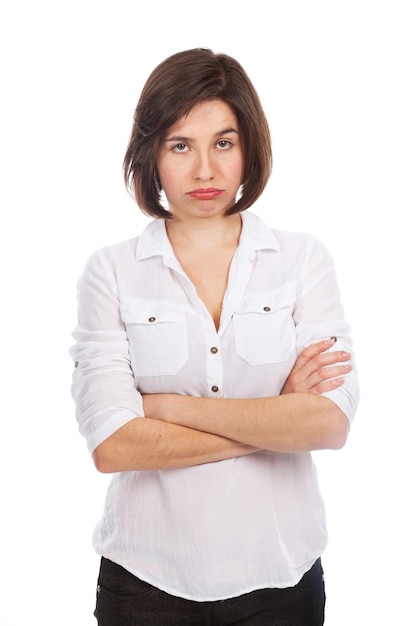 Portrait of a young woman looking bored unhappy isolated on white