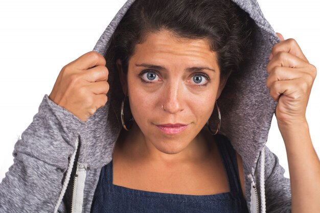 Portrait of young woman looking at camera.